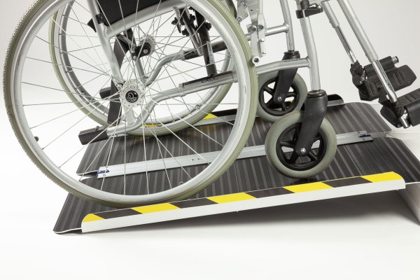 Aluminium wheelchair ramp with anti-slip surface - wheelchair going up ramp 
