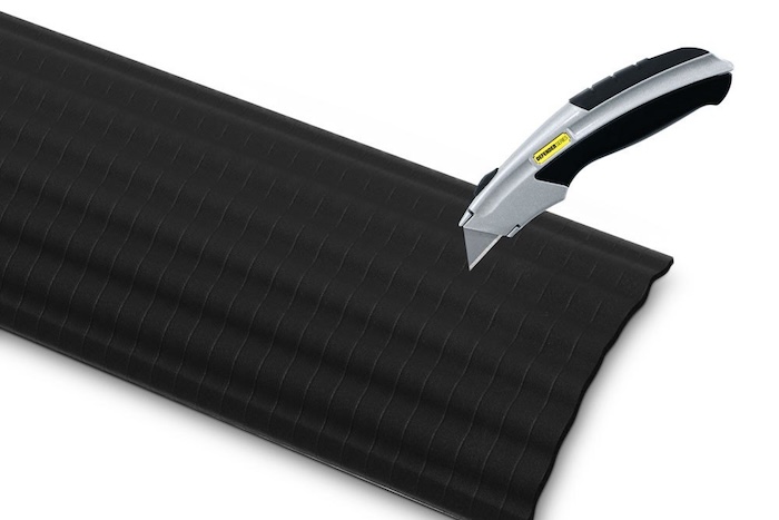 Defender Office cable protector being cut 