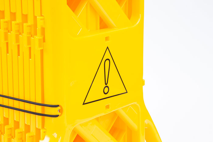 Barrier with warning symbols