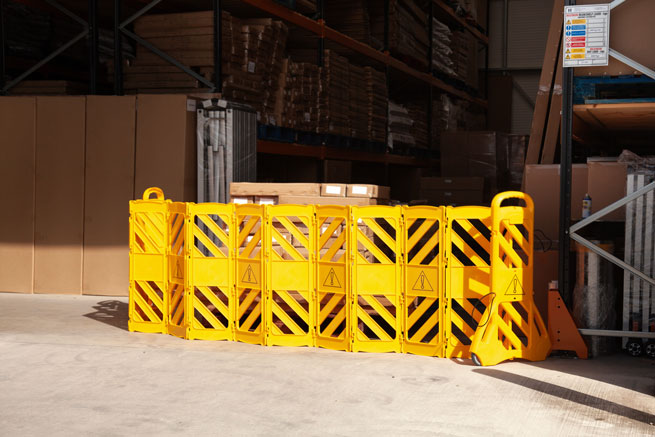 Expandable barrier in warehouse 