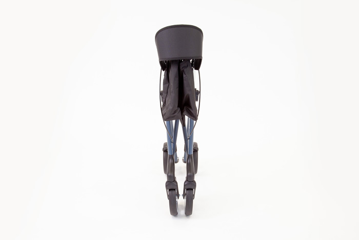 Folded red rollator