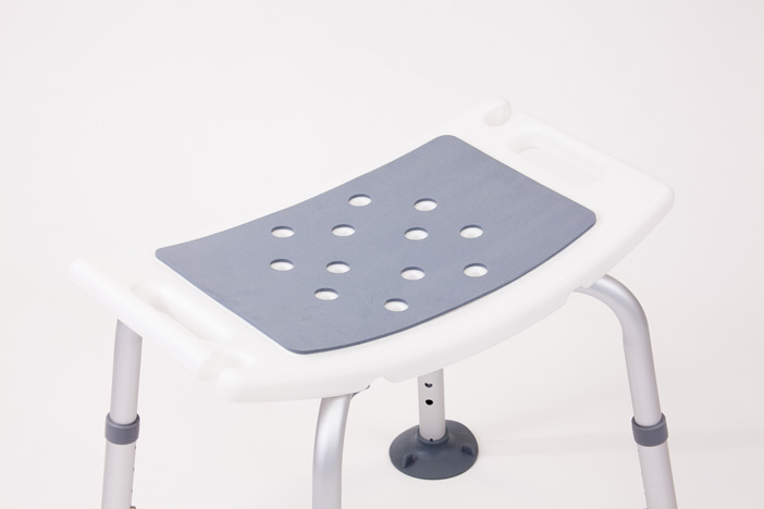 White folding shower stool with curved feet 