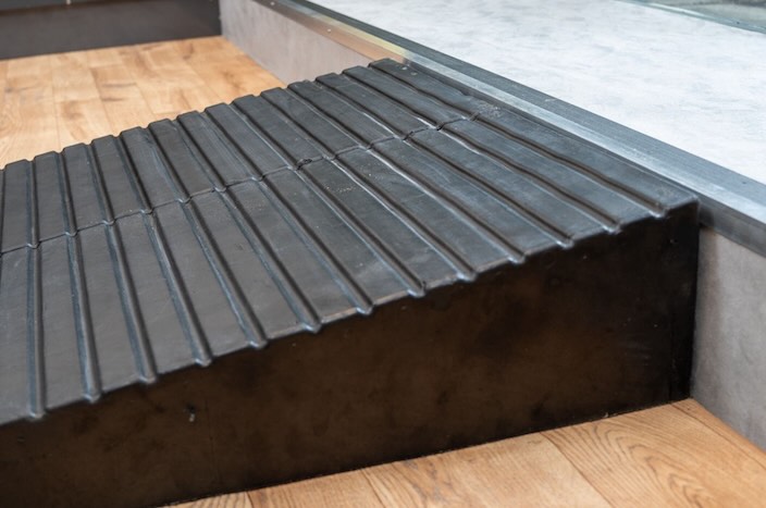 Rubber ramps infront of step 