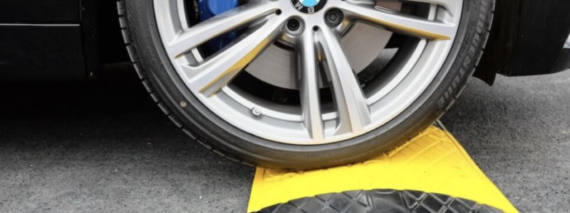 Car passing over speed bumps 