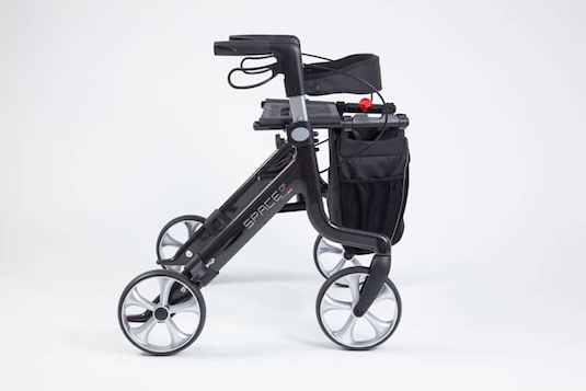 Side view of the carbon rollator with bag and backrest Side view of the carbon rollator with bag and backrest