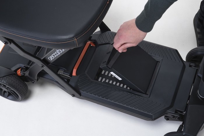 Mobility scooter batter being removed