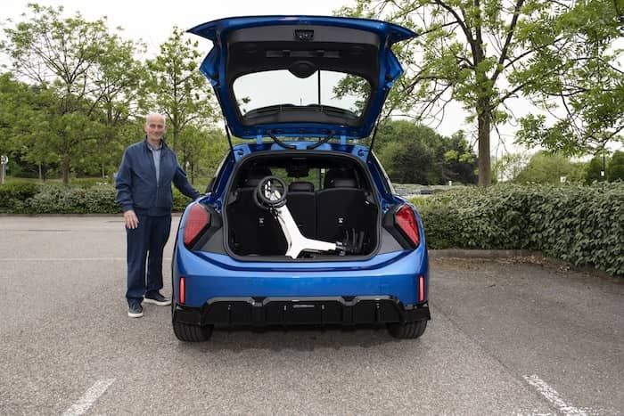 Folded Rollator stored in car boot