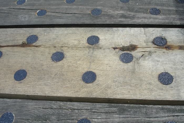 Anti-slip discs on decking 