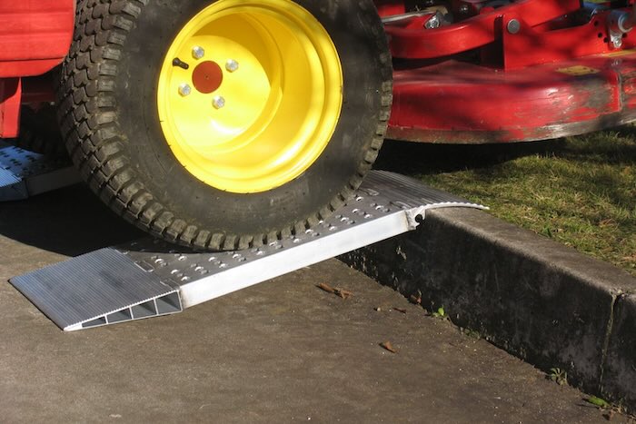 Container ramp resting on step 