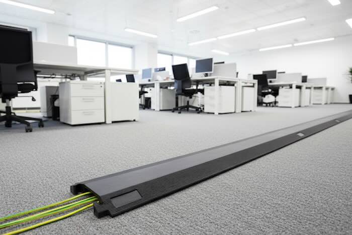 Black cable cover in office 