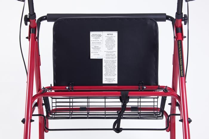 Seat lifted to access basket on a rollator