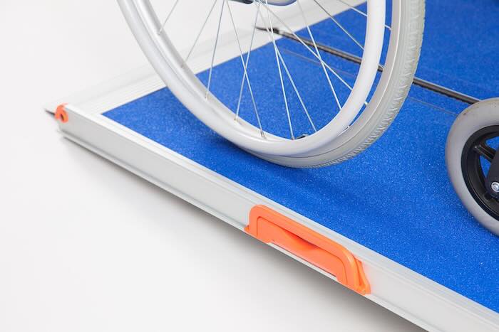 Wheelchair ramp with carry handle