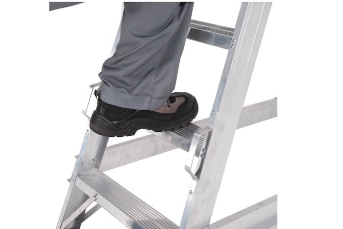 Man climbing aluminium ladder 