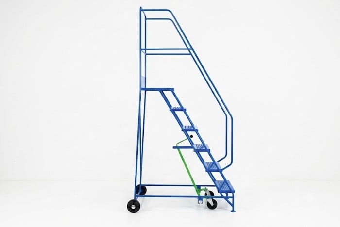 Side view of the blue steel mobile safety steps on wheels with a central brake 