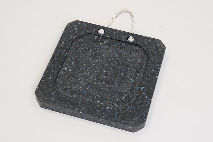 Crane stabliser pad with carry handle 