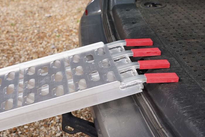 Motorbike ramps resting on van