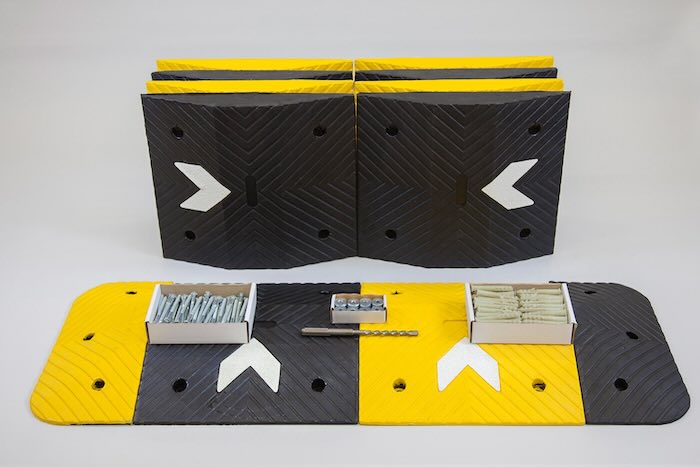 Speed bump kit including middle sections, end caps and fixings 