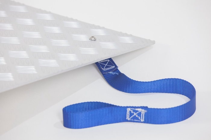 Wheelchair ramp with strap