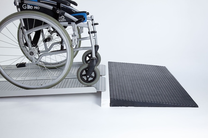 Wheelchair bridge ramp system 