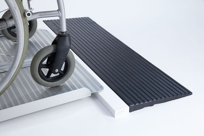 Folding wheelchair ramp combination 