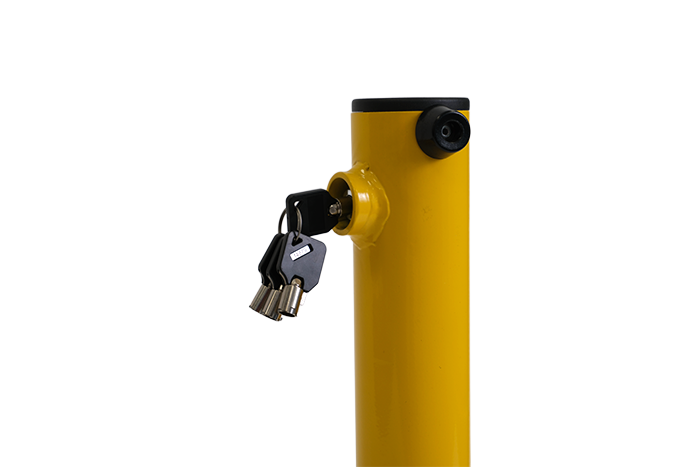 yellow bollard with keys 