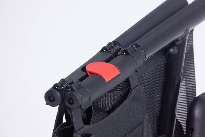 Folded rollator, clips shut when stored