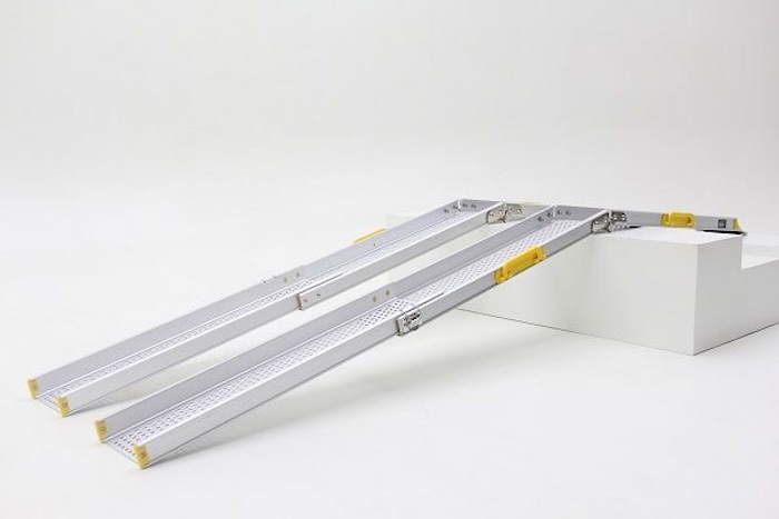 Extendable telescopic and folding wheelchair ramps bridging step 