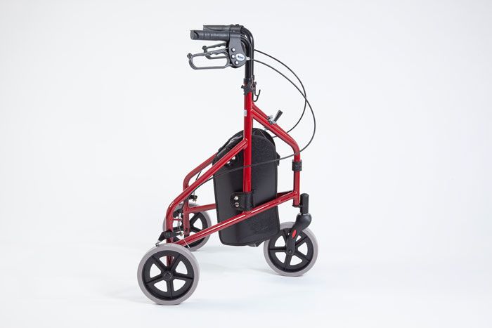 Side view of the red tri-walker with bag 