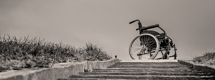 Wheelchair at the top of steps