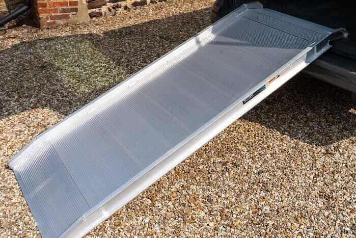 Van ramp resting on van 