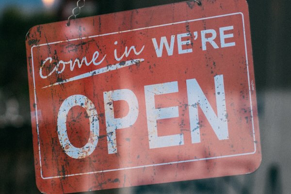 Come in we are open sign 