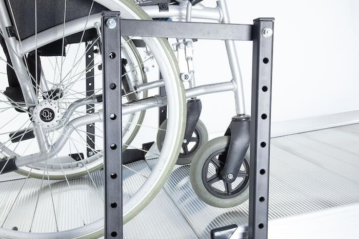 Wheelchair ramp joining support